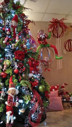 a christmas tree decorated with red and green ornaments