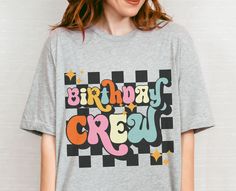 Be part of the Birthday Crew and party it up in this aesthetic, retro birthday t-shirt. It features a groovy, checkered design with a vintage feel. Made of a 100% combed and ring-spun cotton,(heather colors contain polyester), this t-shirt is comfortable and breathable, making it great for all-day wear. Perfect for anyone who loves the retro vibe, this t-shirt is sure to make a statement at any birthday celebration. *SIZING INFO* Please check the size chart for your perfect fit. This is a unisex Trendy Womens Shirts, Groovy Shirt, Groovy Birthday, Aesthetic Birthday, Shirts Aesthetic, 40th Birthday Shirts, Family Birthday Shirts, Checker Design, Bday Gift