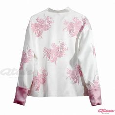 Qteee - Timeless Embroidered Satin Shirt with Long Sleeves and Buckle Design Spring Motif Long Sleeve Blouse, White Long Sleeve Shirt With Embroidered Graphics, Spring Long Sleeve Blouse With Motif, Embroidered Crew Neck Blouse, White Crew Neck Top With Floral Embroidery, White Embroidered Long Sleeve Top, Cotton Long Sleeve Tops With Motif, Casual Long Sleeve Top With Contrast Embroidery, White Embroidered Crew Neck Blouse