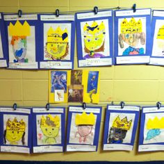 a bulletin board with pictures of children's crowns hanging on it and pinned to the wall