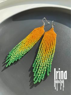 Orange and green earrings Beaded earrings Gradient seed bead earrings Long fringe earrings Native dangle earring beadwork jewelry Green Beaded Long Drop Jewelry, Handmade Green Dangle Beaded Earrings, Handmade Green Beaded Dangle Earrings, Green Dangle Earrings With Tiny Beads, Green Beaded Bohemian Chandelier Earrings, Bohemian Green Beaded Chandelier Earrings, Green Fringe Beaded Drop Earrings, Green Beaded Fringe Chandelier Earrings, Green Bohemian Earrings With Beaded Fringe