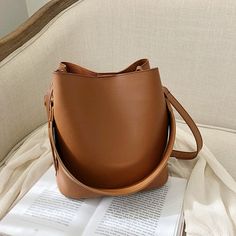 Brand Name: MR.YLLSShape: BucketPlace Of Origin: HE BEI ?ProvinceHandbags Type: Shoulder BagsTypes of bags: Shoulder HandbagsOrigin: CN(Origin)Main Material: PUClosure Type: HaspHardness: SoftExterior: NONEStyle: CasualModel Number: ZZ867Occasion: VersatileGender: WOMENPattern Type: SolidNumber of Handles/Straps: SingleInterior: Interior Zipper PocketInterior: No PocketDecoration: TasselItem Type: Handbagscolor: black,brown,khiki,greenstyle: fashion,lady,casual,luxurygender: females,feminine,wom Bucket Handbags, Black Bucket, Women Crossbody Bag, Types Of Bag, Womens Tote, Wide Straps, Large Bags, Shoulder Handbags, Fashion Handbags