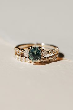 sapphire engagement ring, eternal harmony Green Sapphire Engagement Ring With Wedding Band, Green Sapphire Wedding Ring Set, Ethical Diamond Engagement Ring, Green Sapphire Engagement Ring Oval, Beach Inspired Engagement Rings, Sapphire Engagement Ring Green, Green Sapphire Rings, Green Sapphire Wedding Ring, Green Sapphire Engagement Ring Vintage