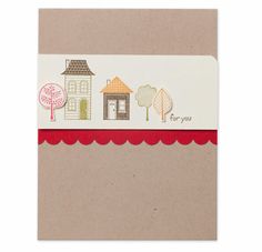 a card with a house and trees on it