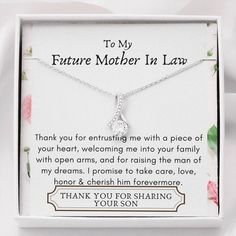 a mother's necklace in a gift box with the message to her on it