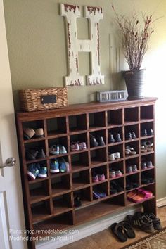 there is a shoe rack in the hallway