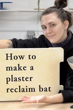 a woman holding up a sign that says how to make a plaster reclain bat