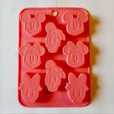 an image of mickey and minnie mouse cookie molds