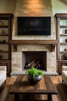 a living room filled with furniture and a flat screen tv mounted above a fire place