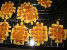 some waffles are cooking on a grill