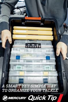 a man holding a toolbox full of tools and other items with the title, a smart yet simple way to organize your tackle box