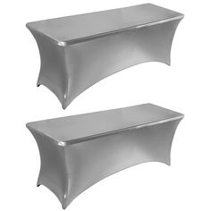 two silver metal shelfs sitting next to each other