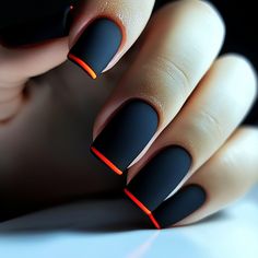 A bold and eye-catching manicure featuring black nails with a pop of orange. The nails are shaped into a square and finished with a matte top coat. Edgy Christmas Nails, Nail Polish Ideas, Black Ombre Nails, Black Gel Nails, Nails Orange, Orange Nail Designs, Orange Nail, Nail Art Products, Matte Black Nails