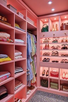 the closet is filled with lots of shoes and handbags