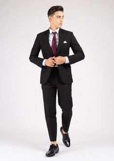 Step out in stylish confidence with the Hudson Black Stretch Suit. Crafted from black stretch cotton for extra comfort and movement, this sophisticated suit will leave you feeling effortlessly put-together. Black Professional Pantsuit For Business, Modern Black Suits For Workwear, Black Notch Lapel Pantsuit For Business Casual, Black Professional Pantsuit For Business Casual, Tailored Black Suit For Office Wear, Black Tuxedo Style Business Casual Pantsuit, Sleek Black Suits For Office Wear, Sleek Black Pantsuit With Notch Lapel, Black Slim Fit Suit For Business Casual