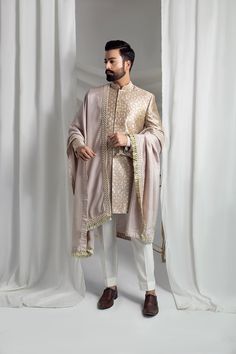 Elevate your formal attire with our Beige Prince Coat. Made from pure atlas material, this coat boasts a luxurious pure silk lining, perfect for any special occasion. The included raw silk kurta pajama and shawl, featuring embroidered borders, complete the elegant look. 4-Piece Suit Raw Silk Kurta, Prince Coat, Silk Kurta, Kurta Pajama, Formal Attire, Raw Silk, Wedding Men, Winter Women, Pure Silk