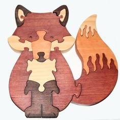 the wooden puzzle is shaped like a fox