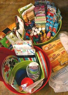 two baskets filled with various items on top of a table