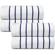 three white and blue towels stacked on top of each other