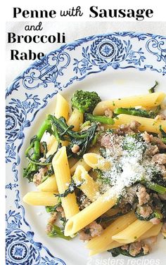 pasta with sausage and broccoli on a blue and white plate