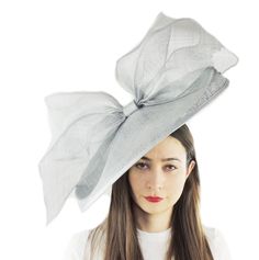 Hats By Cressida British Birds Collection Barn Owl Fascinator Hat Gorgeous extra large sinamay flat hat trimmed with a modern take on a bow. Measures 48cm wide or about 19 inches We can make this in many different colours. If you prefer the bow to be a different colour to the base just state this when you pay. On a headband. Headband Colour: We always try and match the band to the fascinator. If we cant do this the band colour will be Black. If you dont wish a black band please supply an alterna Kentucky Derby Fascinator, Flat Hat, Feather Headpiece, Derby Fascinator, British Birds, Dubai Wedding, Flat Hats, Fascinator Hat, Royal Ascot