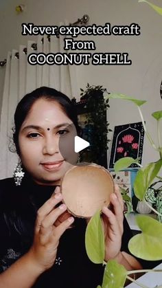 a woman holding up a coconut shell in front of her face with the caption never expect craft from coconut shell