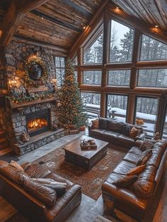 a living room filled with furniture and a fire place in the middle of a room