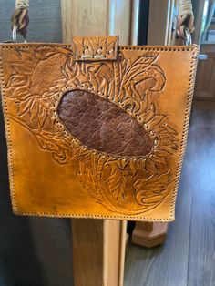 Hand tooled and all made by hand, Real Ostrich in center of sunflower, and phone pocket, all leather Leather Sunflower Pattern, Sunflower Purse, Leather Tooled Sunflower, Leather Sunflower, Rectangular Everyday Bag With Sunflower Print, Vintage Brown Hand Tooled Satchel, Leather Purse, Leather Purses, Shoulder Bags