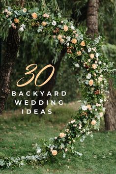 a floral arch with the words 30 backyard wedding ideas in front of trees and flowers