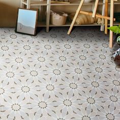 a living room with a large tile floor