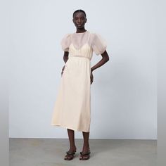 Brand New With Tags Round Neck Midi Dress With Short Puff Sleeves And Elastic Cuffs. Matching Tonal Fabric Hem Detail. Elastic Waistband. Back Opening With Closure. Zara Ribbed Dress, Pink Pleated Dress, Ribbed Bodycon Midi Dress, Lime Green Dress, White Eyelet Dress, Boho Midi Dress, Tee Shirt Dress, Long Sleeve Blouse Pattern, Ivory Dresses