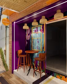 a room that has some chairs and a table in it with purple paint on the walls