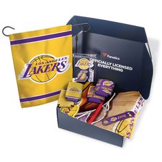 the los angeles lakers basketball gift box is open and ready to be used as a present