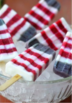 red, white and blue pops in a glass bowl