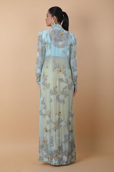 Sky blue long cape with floral, beads and thread embroidery. Comes with a yellow skirt and a bustier. - Aza Fashions Spring Reception Long Sleeve Kurta, Fitted Kurta For Spring Reception, Blue Floral Embroidered Outerwear For Wedding, Fitted Blue Outerwear With Chikankari Embroidery, Floral Cape, Long Skirt Set, Long Cape, Anamika Khanna, Yellow Skirt