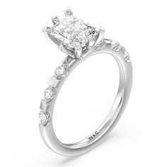 a diamond engagement ring on a white background