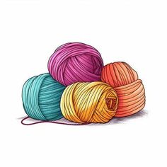 three balls of yarn sitting next to each other