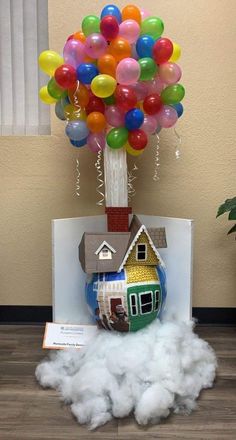 there is a house in the clouds with balloons