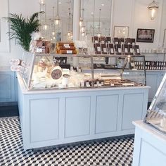 a bakery with lots of pastries and desserts on display