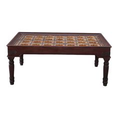 a wooden table with tile top and legs