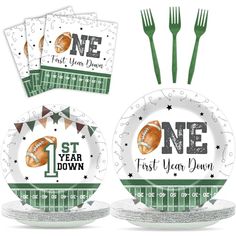 a set of paper plates and forks with the number one football themed design on them