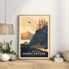 a harry potter poster hangs on the wall next to a lamp and potted plant