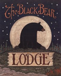 the black bear lodge sign is shown in front of a full moon and stars sky