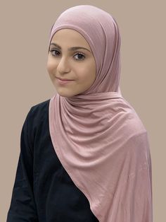 Our Modish Girl-Instant Hijabs are a must have! They are custom made for petite young girls. They are pre-sewn to easily slip on & wrap effortlessly. The Modish Girl Instant Premium Jersey Hijab-Dusty Rose was designed to be a head wrap that is ready in seconds. Simply pull over your head and adjust your hijab into place. It’s that simple!!! No pins required. Made from a high quality jersey fabric that feels cooling and breathable for ultimate comfort all day long. Our goal was to create the mos Ribbed Jersey Hijab, Jersey Scarf Hijab Styles, Cheap Women's Hijab For Eid, Neck Coverage Hijab, Hot Pink Jilbab, Instant Hijab, Jersey Hijab, Active Women, Fine Fabric