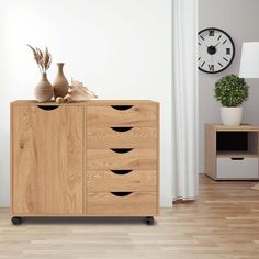 a wooden cabinet with five drawers in front of a wall clock and vases on the floor