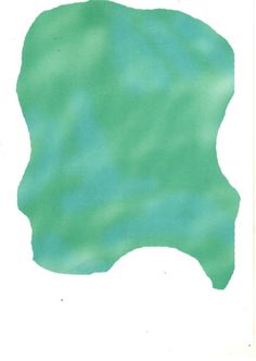 a piece of paper that is green with some blue and white paint on the top