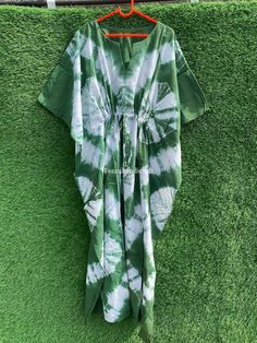 Indian Hand-Tie Dye Print Kaftan Dress, Summer Cotton Caftan, Boho Hippie Style, Beach Wear, Night Wear Gown, Caftan Dress, Women's Dress, Measurements : Bust-50 inches (one size Fits all) Length in inches :- Below the knee:- 52 inches , Mid-Calf :- 42 inches, Above the knee :- 32 inches Size: Free Size Kaftan Color: Multi-color as Shown in Image. Note: The color and brightness of actual product may vary due to digital photography and photo editing. We crossed check each and every product before listing. If you have any inquiry feel free to message us. Payment policy: We accept the payment by paypal. International buyers are responsible for their countries duties and taxes. Shipping Policy We ship the Item Worldwide By DHL Express, Fedex & Indiapost. Thanks for your time. Green Bohemian Beach Dress With Short Sleeves, Green Tunic With Kimono Sleeves, Long Batik Print Kaftan For Spring, Long Kaftan With Batik Print For Spring, Long Spring Kaftan With Batik Print, Casual Summer Thobe In Maxi Length, Free Size Long Sleeve Thobe For The Beach, Casual Summer Maxi Length Thobe, Green V-neck Free Size Kaftan