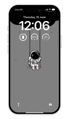 an iphone screen showing the date and time on it, with astronaut floating in space