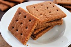 some crackers are sitting on a white plate