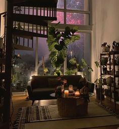 a living room filled with furniture and a firework display in the window sill